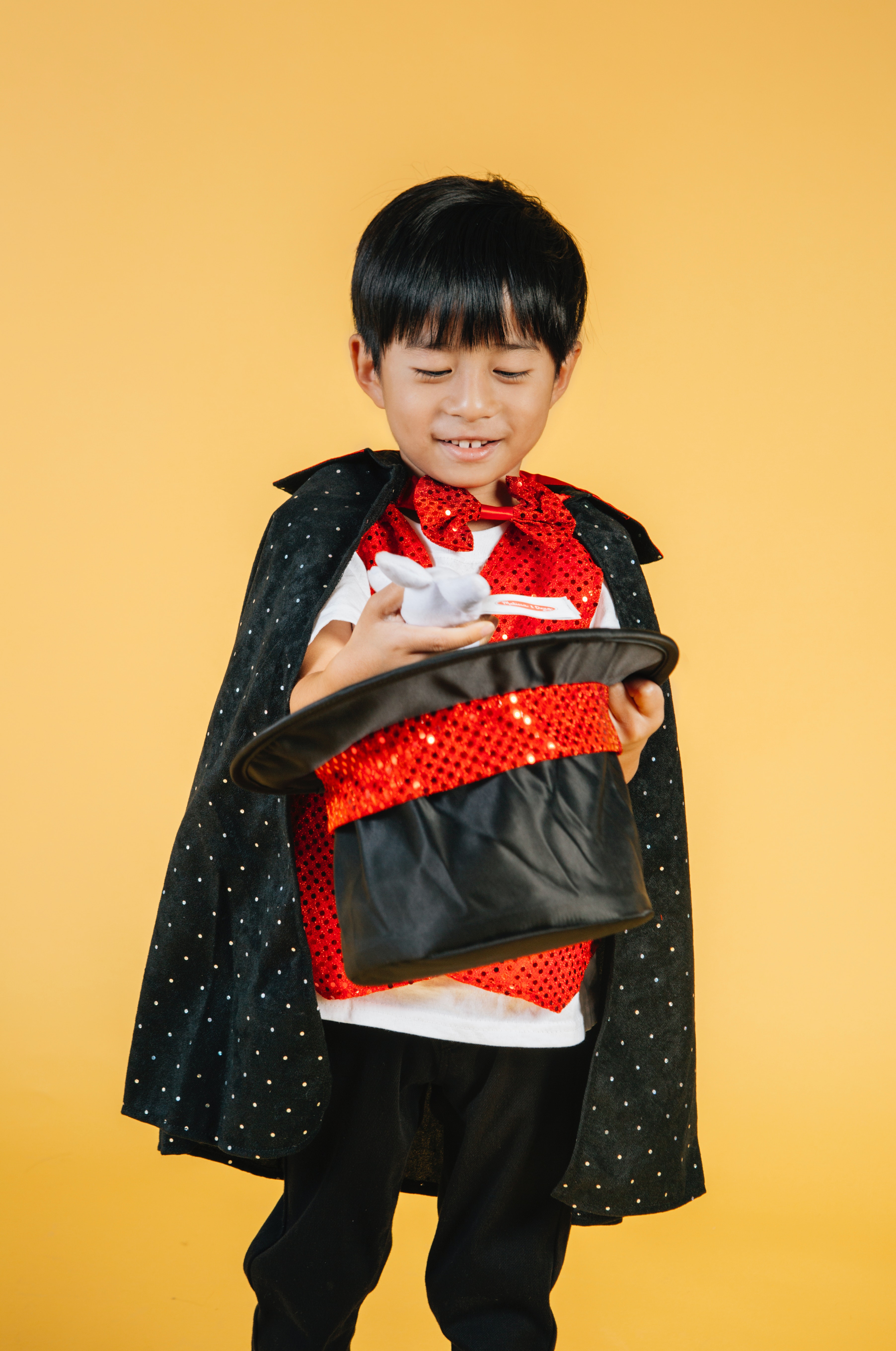 Photo by Amina Filkins from Pexels: https://www.pexels.com/photo/happy-little-asian-boy-in-magician-costume-doing-trick-5560049/
